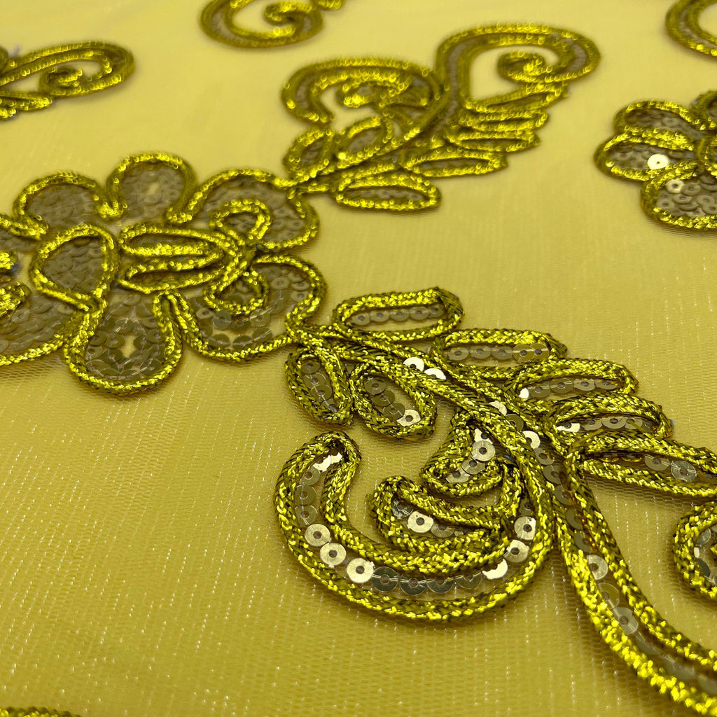 Gold metallic floral lace lined with yellow poly-satin