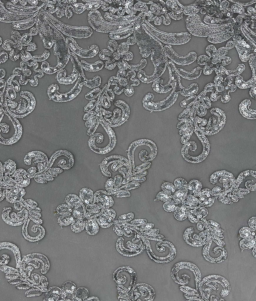 Silver metallic floral lace lined with gray poly-satin.
